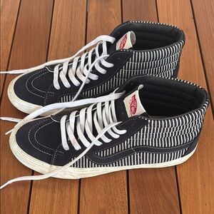 Vans Black and White High-Top Sneakers with Striped Design
